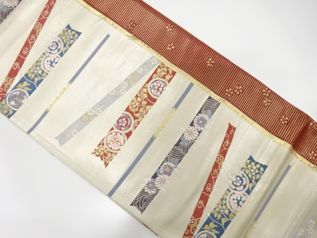 変わり横段に花唐草模様織り出し袋帯